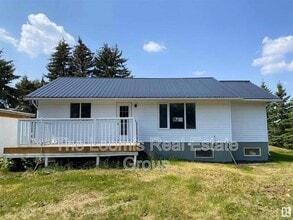 Building Photo - 5102-5148 48 Ave