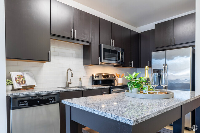 1BR, 1BA - 732SF - Kitchen - The Julian at Fair Lakes