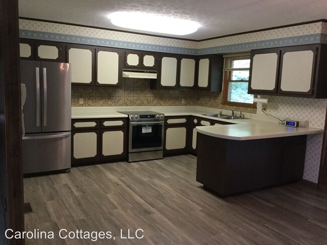 Foto del edificio - 3 br, 1.5 bath House - 65 Sam King Road