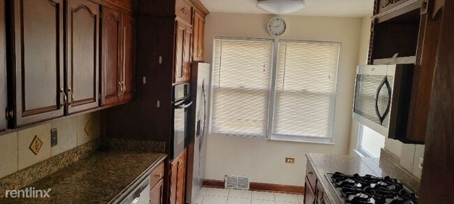 Building Photo - 4 br, 3 bath House - 9151 Kostner Ave