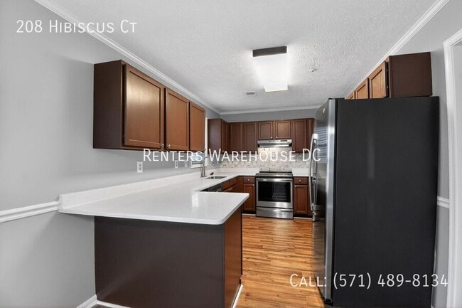 Building Photo - 208 Hibiscus Ct