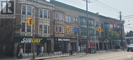 Building Photo - 1399-1399 Queen St W