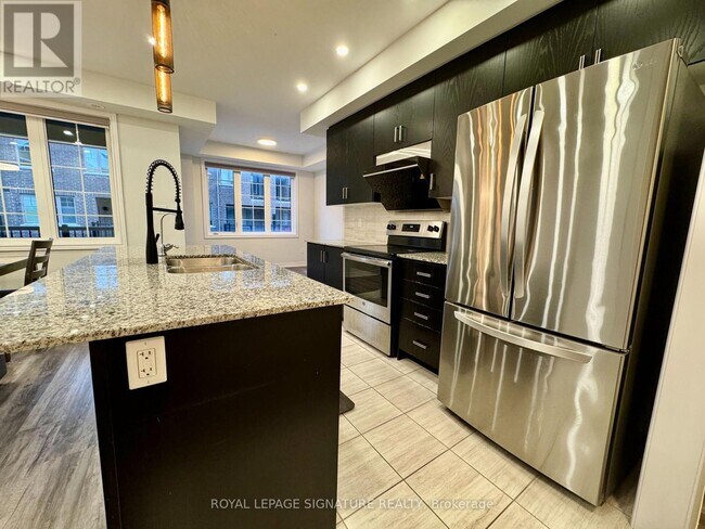 Photo du bâtiment - 139 Frederick Wilson Ave