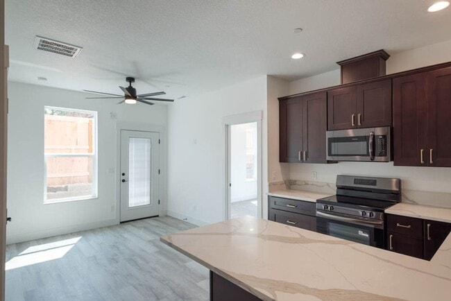 Building Photo - NEW CONSTRUCTION 1BD W/GARAGE & YARD