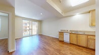 Located at 15305 Lanark St in Los Angeles, CA, this single-floor, one-bedroom, one-bathroom unit offers a well-organized and functional layout. Warm hardwood-style flooring runs consistently throughout the space, creating a cohesive and inviting atmosphere.

The kitchen is efficiently designed with honey-toned wood cabinetry extending to the ceiling for ample storage, granite countertops, a double-basin sink, and white appliances including a dishwasher, electric range, and refrigerator. Recessed lighting keeps the kitchen bright and practical.

The bedroom is a comfortable, well-proportioned room featuring a window fitted with horizontal blinds that allow natural light while maintaining privacy. A set of sliding double doors provides closet storage, and the neutral beige walls offer a calm, versatile backdrop.

The bathroom is equipped with a spacious walk-in shower enclosed by sliding glass doors with a chrome frame, complemented by grab bars for added accessibility. The hardwood-style flooring continues here, tying the space together seamlessly.

Throughout the unit, the consistent use of light beige walls, white trim, and warm flooring contributes to a clean, bright, and cohesive aesthetic, making this a practical and comfortable space in the Van Nuys neighborhood of Los Angeles.