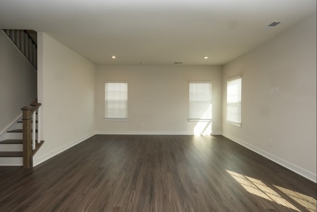 Building Photo - This wonderful home has a covered rocking chair front porch