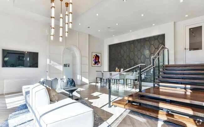 Indoor Lounge Area with Upholstered Sofas and Raised Bar Seating Section - The Lights at Northwinds