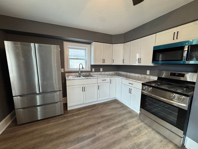 Building Photo - Spacious 4-Bedroom Home with Porch, Deck and Fenced Yard!