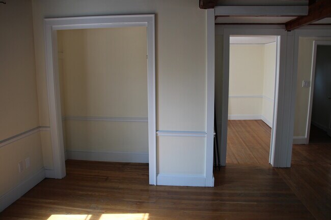 Living Room (includes additional closet/storage space) doorway to dining room on right - 7 Allen Ct