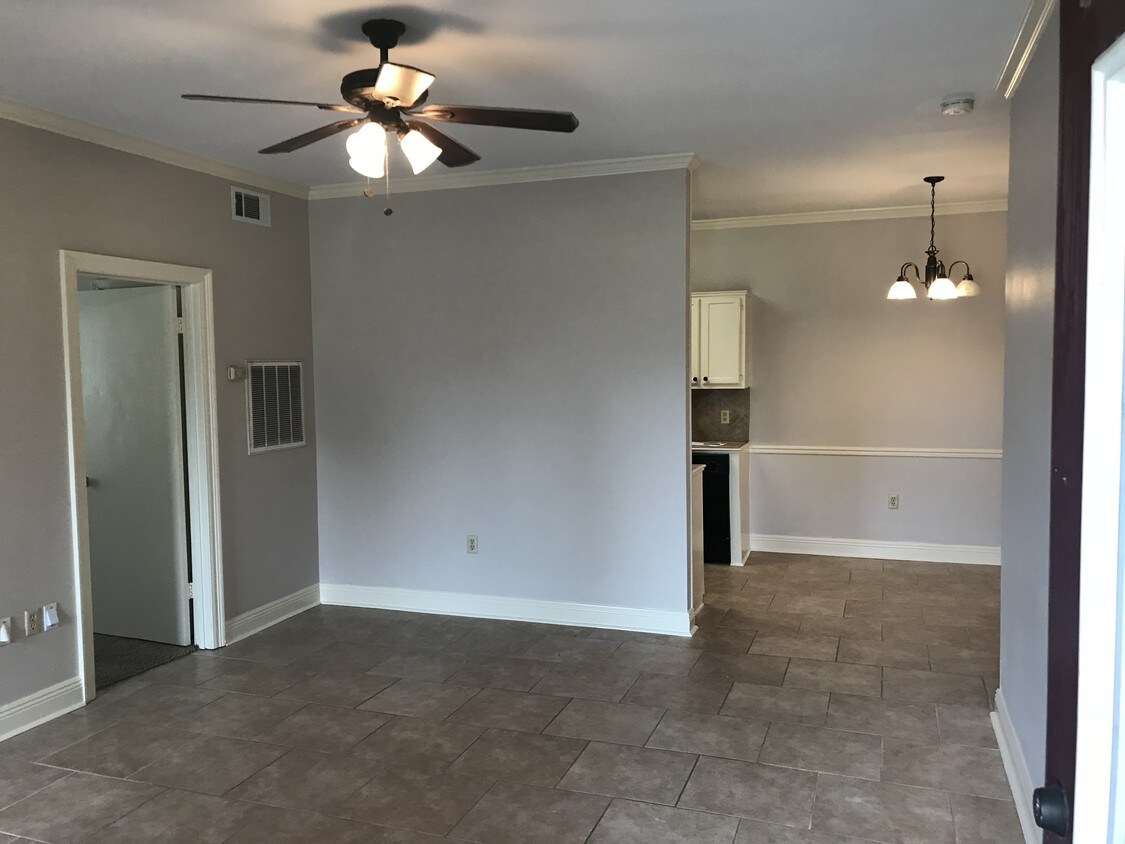 Living room with view of dining area - 15271 Jones Creek Village Ave