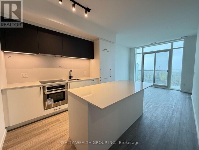 Building Photo - 689-PH689 The Queensway