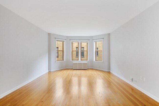 Living Room, new windows - 1214 W Jarvis Ave