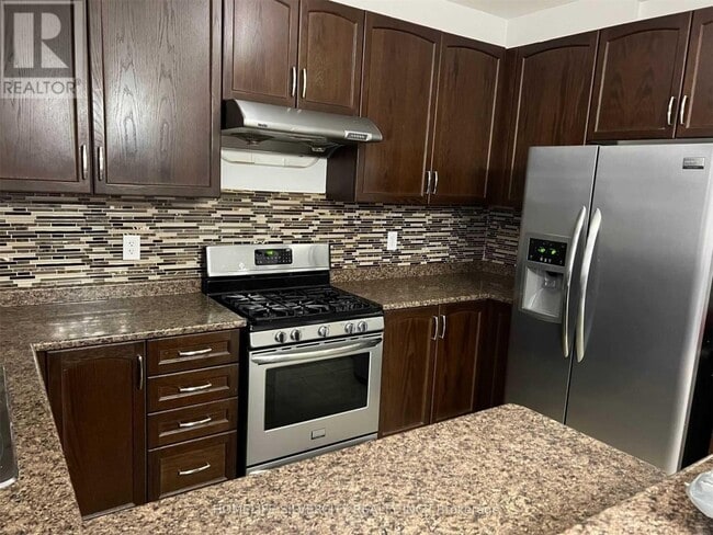 Photo du bâtiment - 87 Summitgreen Crescent