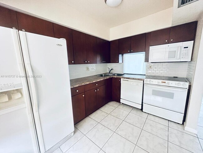 Building Photo - 6070 NW 64th Ave