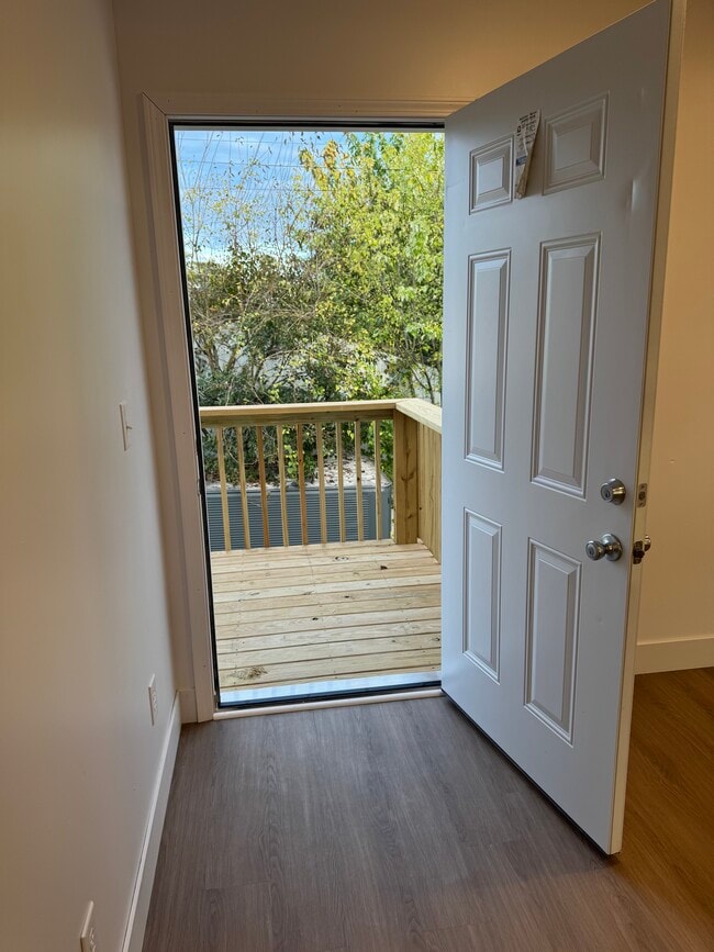 Deck off of Living Room - Sunrise Suites Apartments