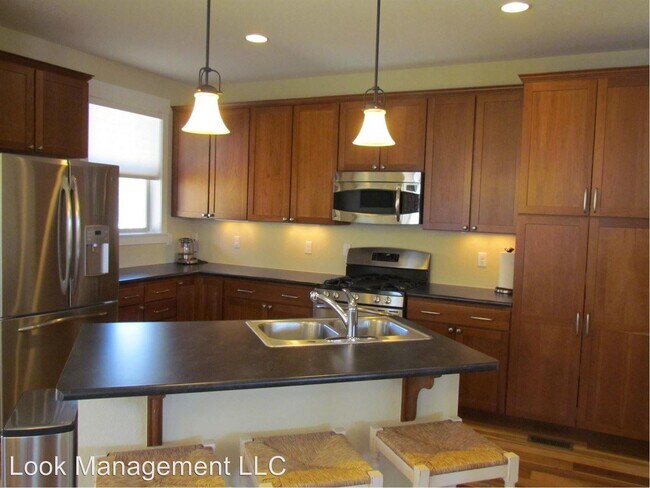 Building Photo - 4 br, 4 bath House - 9067 E 35th Ave