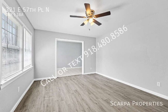 Foto del edificio - 321 E 57th Pl N