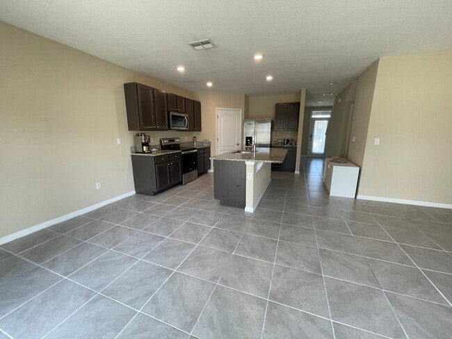 Building Photo - 9009 Tuscan Cypress St