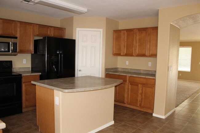 Building Photo - COMING SOON!! 5 BEDROOM 3 BATH W/ HUGHE LO...