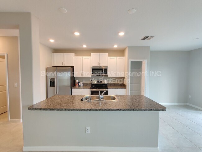 Foto del edificio - 7412 French Marigold Ave.