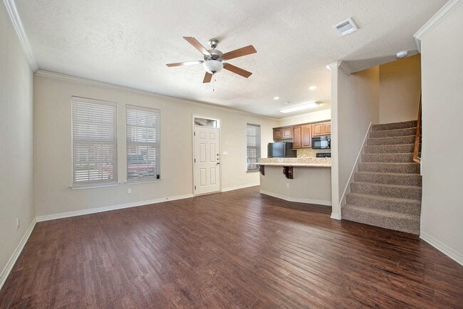 Building Photo - AUGUST PRE-LEASE Spacious 3 Bed, 3.5 Bath Condo with Fenced Backyard