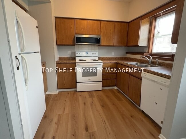 Foto del edificio - 703 11th Ave NW