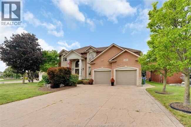 Building Photo - 1585 Stoneybrook Crescent