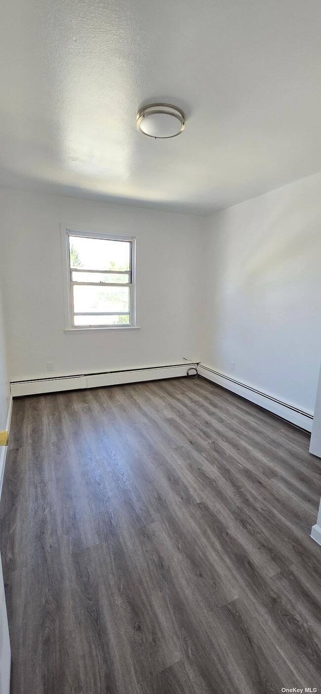 Building Photo - 144-30-144-26 26th Ave
