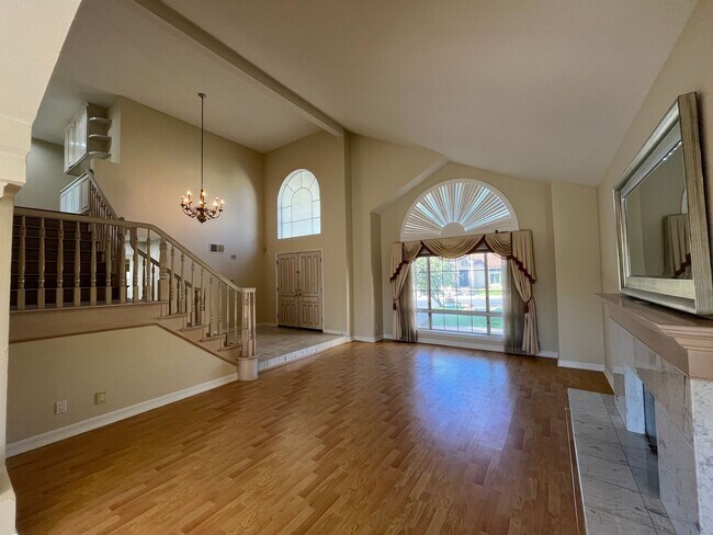 Building Photo - MOVE IN READY 5+4 in guard-gated Porter Ra...