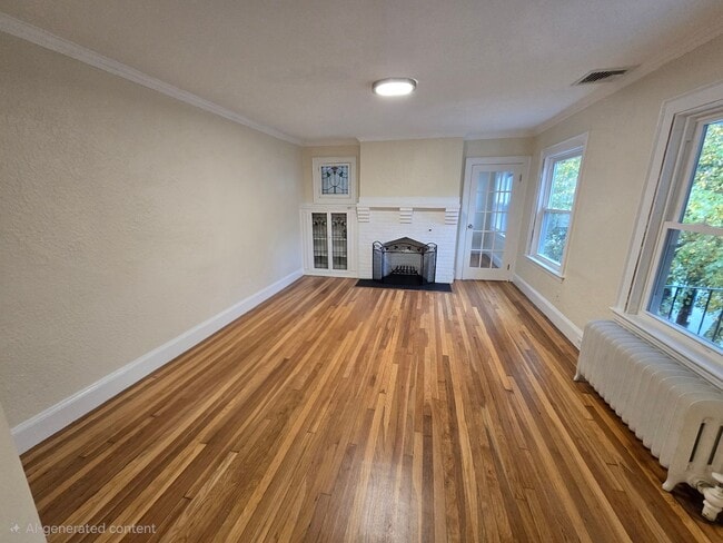 Building Photo - Large Duplex - Off-Street Parking - Centra...