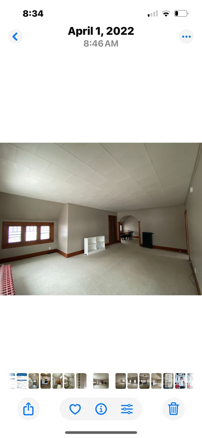 Large living room with partial view of West Bay. - 810 E Front St