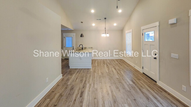 Building Photo - Newly built, spacious open floor concept 3-bedroom 2 bath.  Corner lot and conveniently located j...