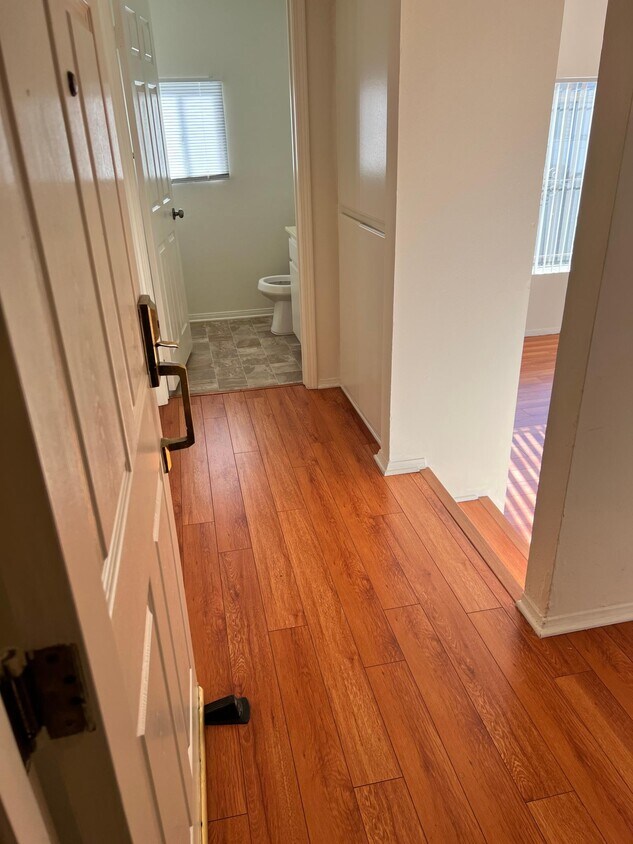 Welcome home! Formal entry, guest bathroom, step down living room - 7039 Kittyhawk Ave