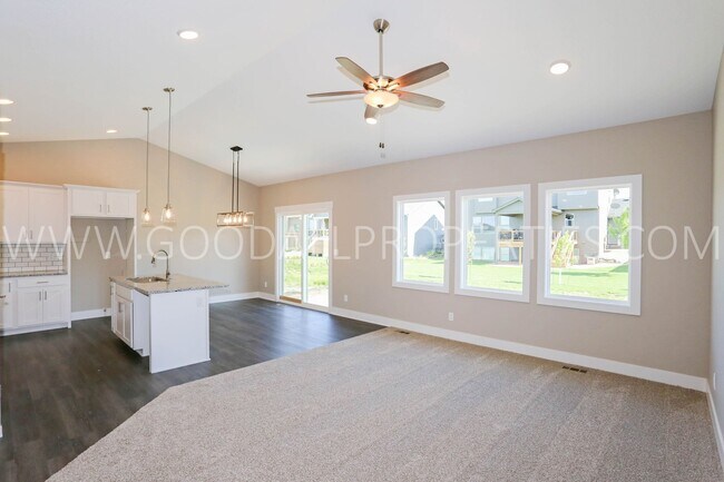 Building Photo - 4-Bedroom Ranch Home in Clive with Finished Basement & 3-Car Garage