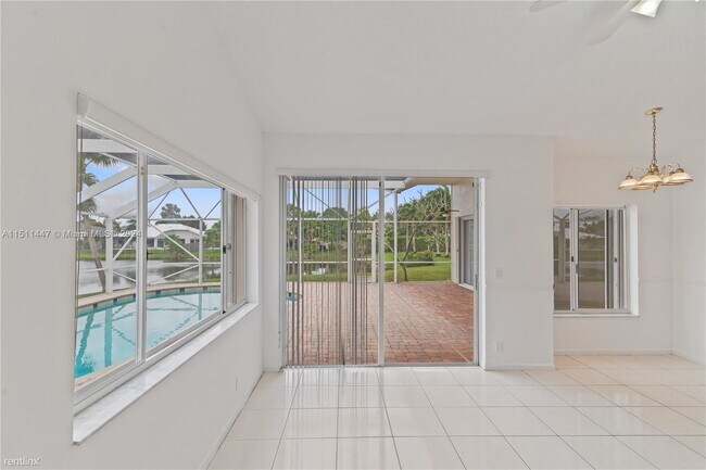 Building Photo - 4 br, 2.5 bath House - 1230 SW 102nd Ave #...