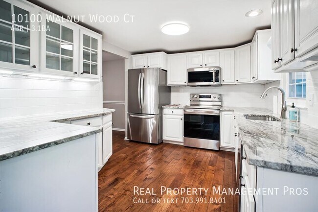 Building Photo - RARLEY AVAILABLE SUN SOAKED FOUR BEDROOM 3...