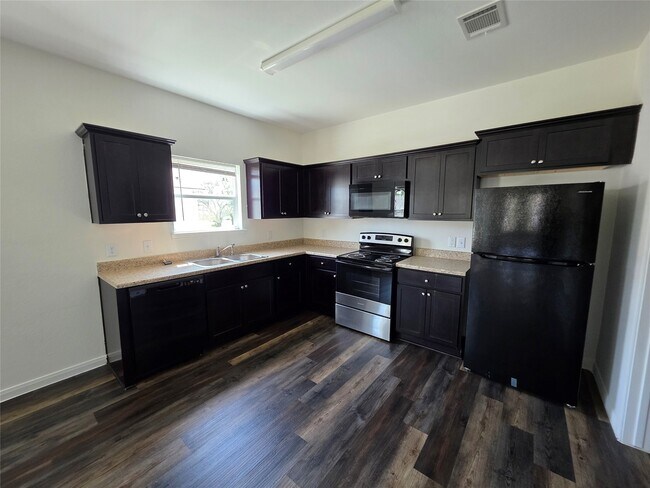 Foto del edificio - 6210 Lacey Oak Dr