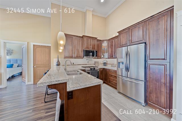 Primary Photo - Spacious Top-Floor Unit with Solarium