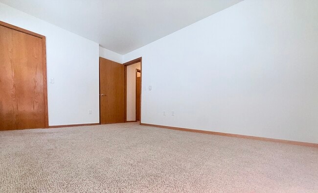 Primary Bedroom - 2 Bedroom - Waitlist - Cross Plains Apartments Near Madison |