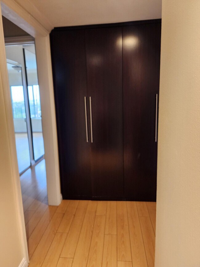 Entry and wall of cabinets/peak view in bedroom - 1517 E Garfield Ave