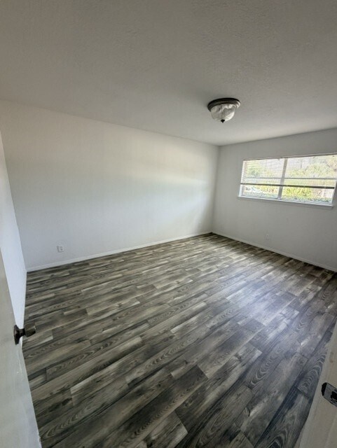 Bedroom- Renovated Unit - Cimarron Apartments