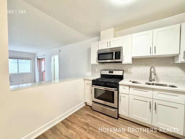 Building Photo - 5128 De Longpre Ave