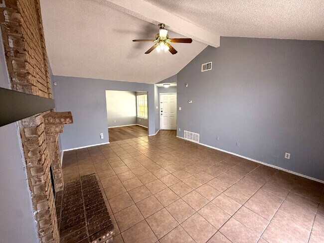 Building Photo - Move-In Ready 3BR/2BA: Updated Kitchen, New Light Fixtures & Fenced Yard