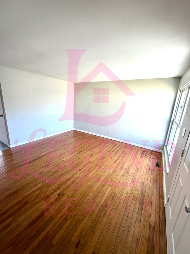 Building Photo - Spacious 4-Bedroom Home with Private Primary Suite & Hardwood Floors!