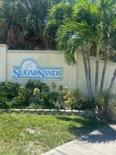 Building Photo - 7648 SE Sugar Sand Cir