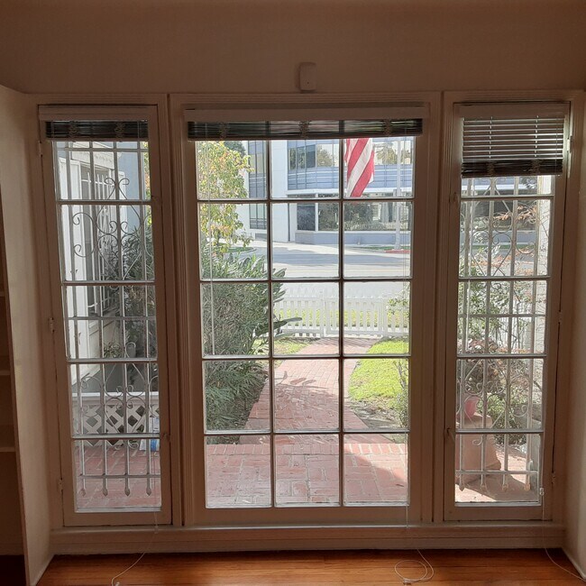 French Doors Open to Red Brick Patio out Front - 9421 W Olympic Blvd