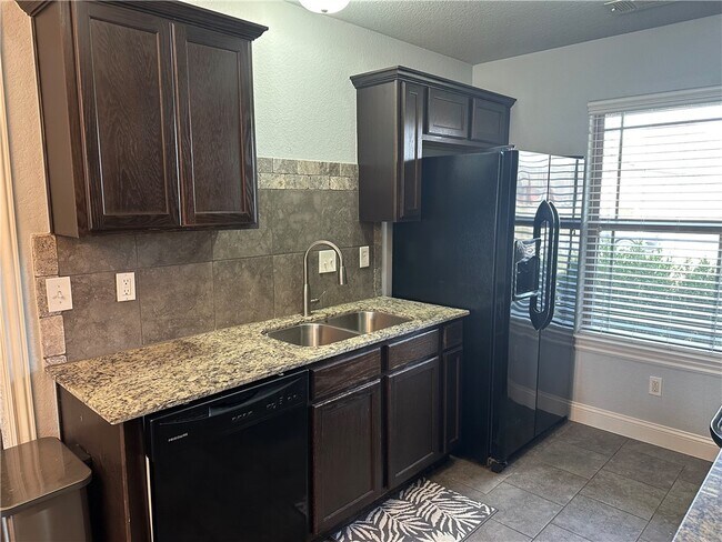 Foto del edificio - 3903 S W Capstone Ave