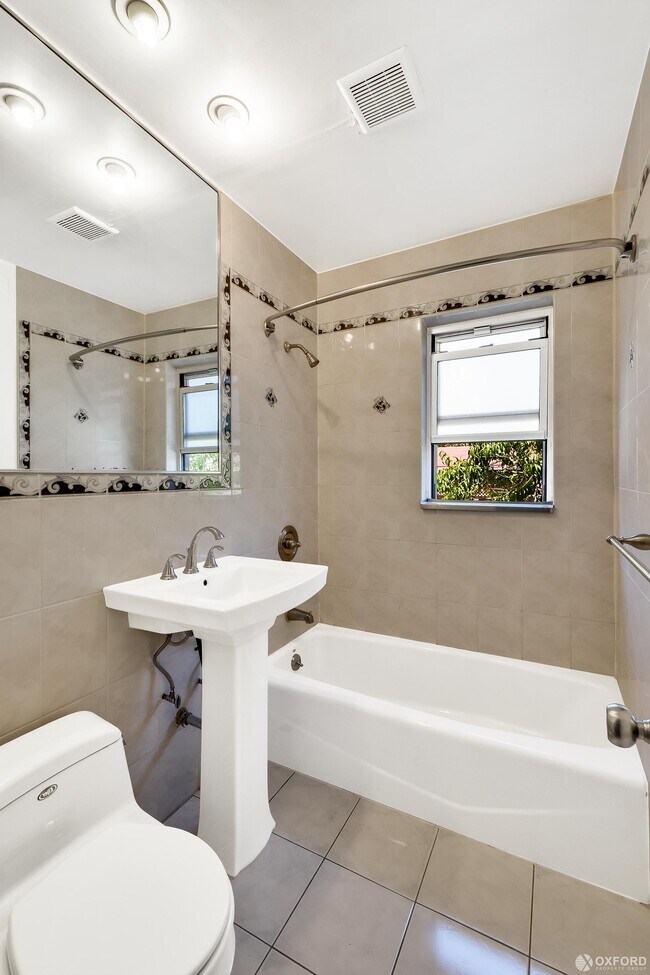 Building Photo - 75-15 Pitkin Avenue