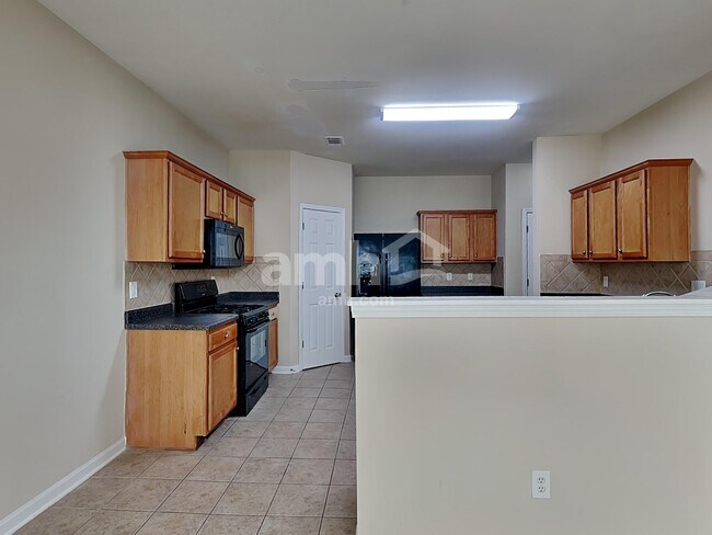 Foto del edificio - 2323 Jasmine Glen Dr