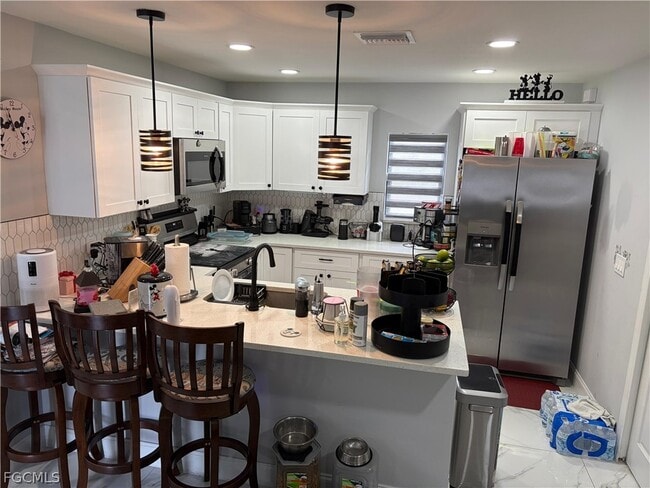 Building Photo - 614 Flamingo Ave S